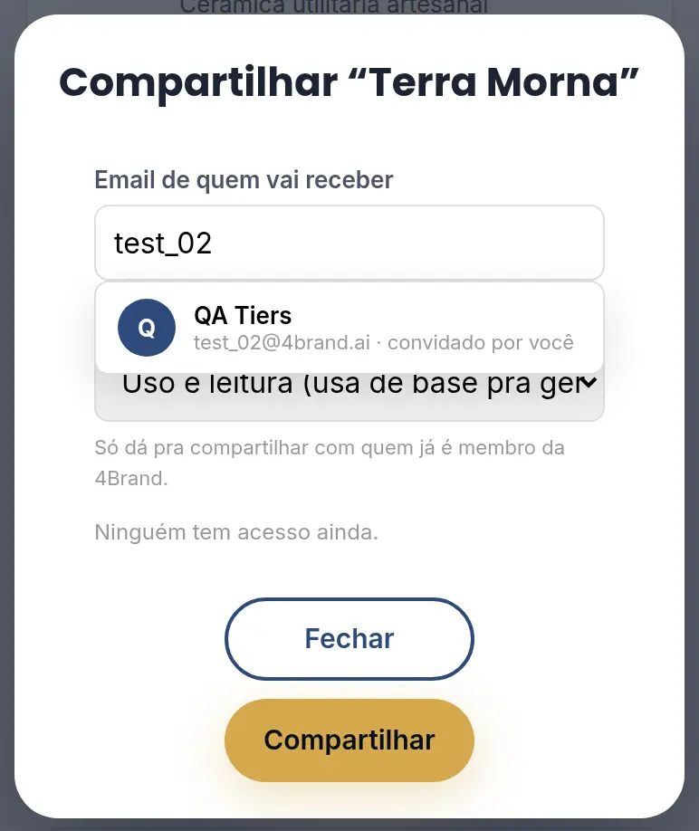 Janela Compartilhar Terra Morna com o e-mail digitado, a sugestão da rede e o botão Compartilhar